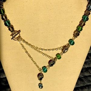 Silver necklace with blue and green glass beads